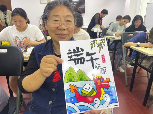 糯香裹吉祥谷粒绣华章